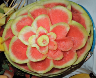 Beautiful Watermelon Creation! Perfect for a fruit  and salad table!  #watermelon #watermelon creation #centerpiece  www.grandparentsplus.com